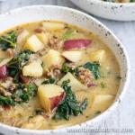 Cozy up to this Whole30 Zuppa Toscana (Dairy-Free Potato Soup Recipe) tonight! Packed with potatoes, sausage and fresh crunchy kale swimming in a lightly spiced broth, you'll think you're at Olive Garden (minus the guilt)! You'll fall in love with this healthy, dairy-free, gluten-free Olive Garden Zuppa Toscana copycat recipe once you give it a try.