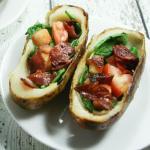 These BLT Whole30 Potato Skins are slathered with ghee and stuffed with spinach, tomatoes and bacon!