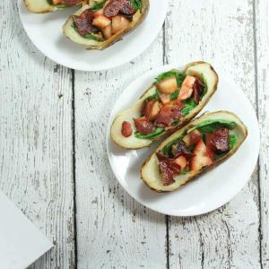 These BLT Whole30 Potato Skins are slathered with ghee and stuffed with spinach, tomatoes and bacon!