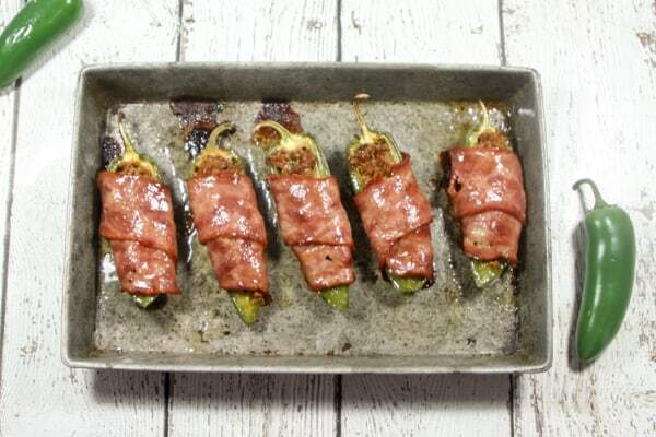 Beefy, creamy, wrapped in bacon and easy to make, these Paleo and Whole30 Jalapeño Poppers are the perfect Super Bowl party snack!