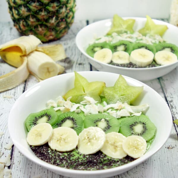 These Paleo and Whole30 Tropical Avocado Smoothie Bowls are on point. Smooth and creamy, they're the perfect detox breakfast after a weekend of cheat meals. 