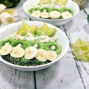 These Paleo and Whole30 Tropical Avocado Smoothie Bowls are on point. Smooth and creamy, they're the perfect detox breakfast after a weekend of cheat meals.