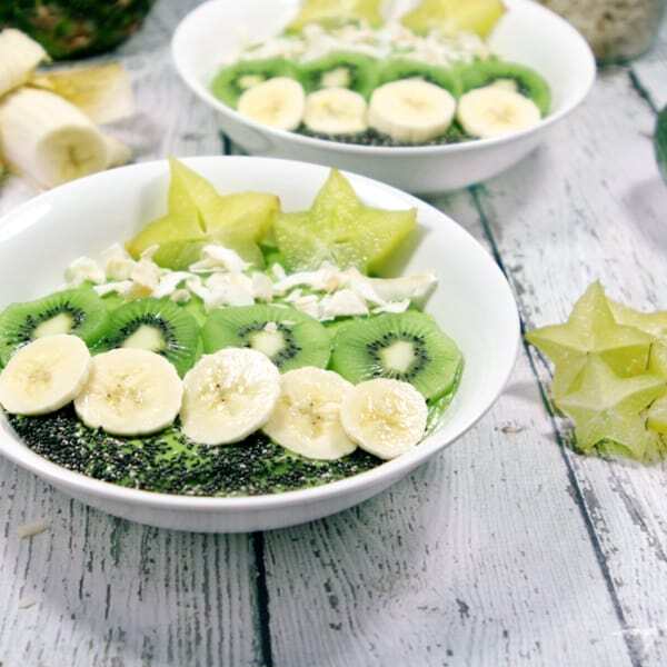 These Paleo and Whole30 Tropical Avocado Smoothie Bowls are on point. Smooth and creamy, they're the perfect detox breakfast after a weekend of cheat meals. 