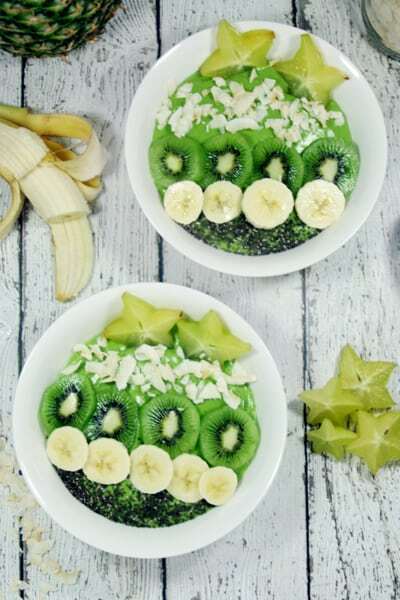 These Paleo and Whole30 Tropical Avocado Smoothie Bowls are on point. Smooth and creamy, they're the perfect detox breakfast after a weekend of cheat meals. 