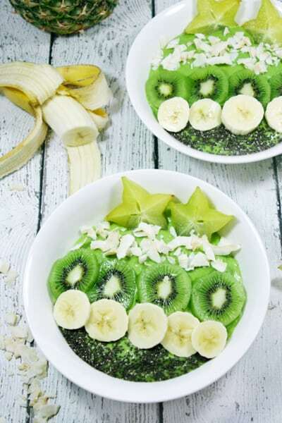 These Paleo and Whole30 Tropical Avocado Smoothie Bowls are on point. Smooth and creamy, they're the perfect detox breakfast after a weekend of cheat meals. 