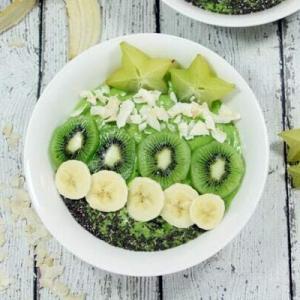 These Paleo and Whole30 Tropical Avocado Smoothie Bowls are on point. Smooth and creamy, they're the perfect detox breakfast after a weekend of cheat meals.