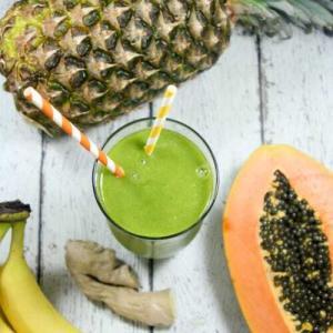 This Pineapple Papaya Green Smoothie is a true tropical treat. The pineapple and papaya make it sweet and luscious while the ginger keeps things exciting.