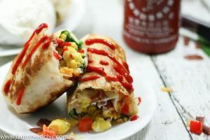 These Bacon and Egg Breakfast Burritos are rolls of ooey-gooey cheesiness + buttery crispiness and are easily altered to fit a Whole30 / Paleo lifestyle!