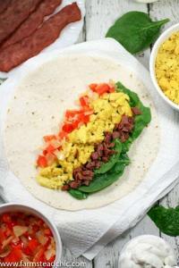 These Bacon and Egg Breakfast Burritos are rolls of ooey-gooey cheesiness + buttery crispiness and are easily altered to fit a Whole30 / Paleo lifestyle!