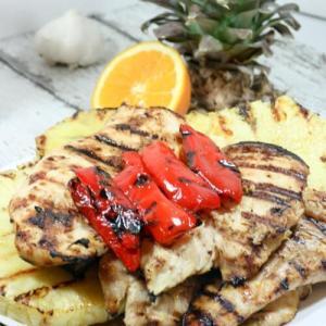 This Pineapple Chile Grilled Chicken Marinade is made with luscious tropical pineapple juice, tart fresh oranges and fiery red chiles. It's Paleo- and Whole30-friendly and comes together in just a few short minutes.