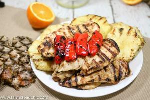 This Pineapple Chile Grilled Chicken Marinade is made with luscious tropical pineapple juice, tart fresh oranges and fiery red chiles. It's Paleo- and Whole30-friendly and comes together in just a few short minutes.