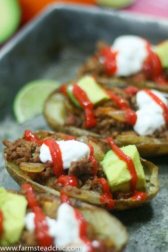 These Whole30 Beefy Taco Potato Skins are crispy and buttery, filled with savory taco meat, tomatoes + onions with an endless array of toppings. Dairy-free!