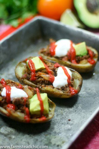 These Whole30 Beefy Taco Potato Skins are crispy and buttery, filled with savory taco meat, tomatoes + onions with an endless array of toppings. Dairy-free!