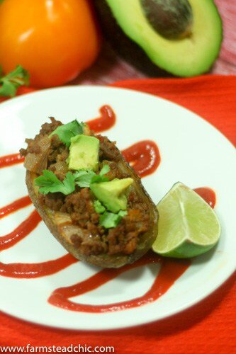 These Whole30 Beefy Taco Potato Skins are crispy and buttery, filled with savory taco meat, tomatoes + onions with an endless array of toppings. Dairy-free!