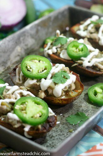 These Whole30 White Chicken Chili Potato Skins are the perfect blend of savory, spicy white chicken chili spooned into salty, crispy, buttery potato skins. Gluten free + dairy free and full of healthy goodness.