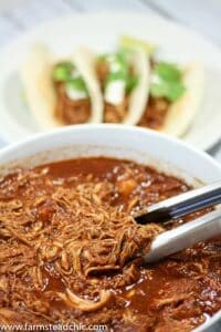 This Paleo and Whole30 Pulled Barbecue Chicken is legit. It's full of flavor, super-simple to make, easy on the budget and Paleo and Whole30-friendly. Grain-free, gluten-fee, dairy-free and all that jazz, too. Slow cooker and Instant Pot recipes included.