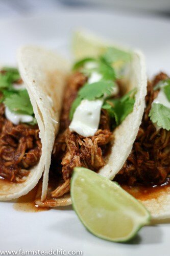 This Paleo and Whole30 Slow Cooker Pulled Barbecue Chicken is legit. It's full of flavor, super-simple to make, easy on the budget and Paleo and Whole30-friendly. Grain-free, gluten-fee, dairy-free and all that jazz, too.