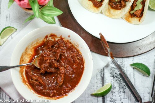 This Paleo and Whole30 Slow Cooker Pulled Barbecue Chicken is legit. It's full of flavor, super-simple to make, easy on the budget and Paleo and Whole30-friendly. Grain-free, gluten-fee, dairy-free and all that jazz, too.