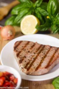 This Paleo and Whole30 Grilled Ahi Tuna with Roasted Red Pepper Relish is super simple to make but bursting with flavor. With ingredients like jarred roasted red peppers, lemon juice, thyme and fresh basil, it's the perfect healthy (20 minute) grilled summer dinner!