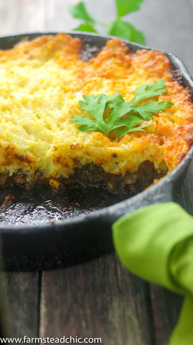 This Whole30 Shepherd's Pie is packed full of savory flavors like thyme and rosemary. Lamb meat is topped with fluffy, buttery mashed potatoes toasted to perfection under the broiler. Dairy free and gluten free. Use ground beef for a Whole30 Cottage Pie instead.