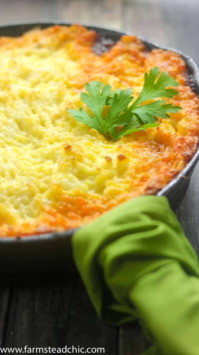 This Whole30 Shepherd's Pie is packed full of savory flavors like thyme and rosemary. Lamb meat is topped with fluffy, buttery mashed potatoes toasted to perfection under the broiler. Dairy free and gluten free. Use ground beef for a Whole30 Cottage Pie instead.