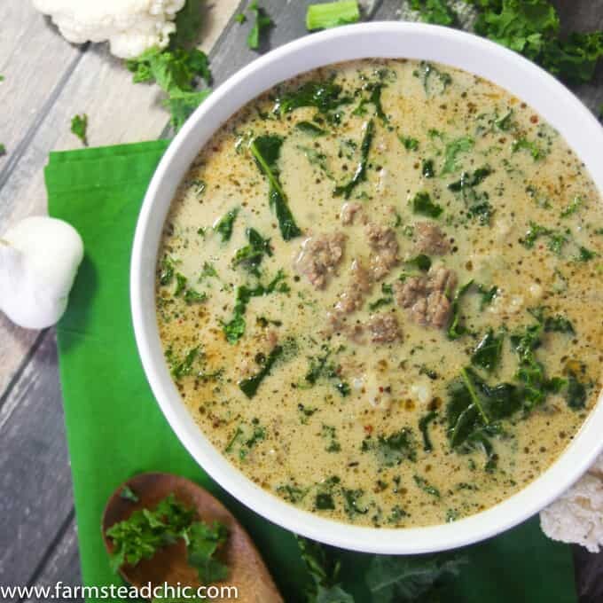 With this Creamy Keto Zuppa Toscana with Cauliflower, you can have your soup, stay low carb + eat it too! Dairy free, gluten free, Whole30, Paleo, low-carb.