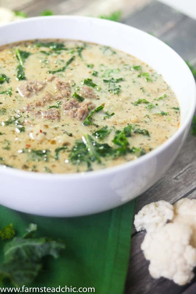 With this Creamy Keto Zuppa Toscana with Cauliflower, you can have your soup, stay low carb + eat it too! Dairy free, gluten free, Whole30, Paleo, low-carb.