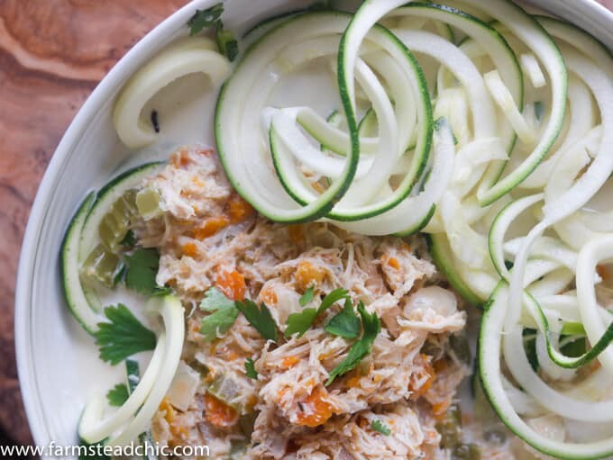 This Paleo and Whole30 Chicken Noodle Soup is gluten-free, grain-free and dairy-free with no added sugar or questionable ingredients. Traditional noodles are replaced with spiralized zucchini, or"zoodles," and the result is an incredibly tasty, truly healthy slow cooker meal with only eight ingredients! 