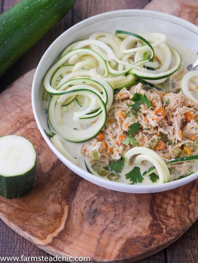 This Paleo and Whole30 Chicken Noodle Soup is gluten-free, grain-free and dairy-free with no added sugar or questionable ingredients. Traditional noodles are replaced with spiralized zucchini, or"zoodles," and the result is an incredibly tasty, truly healthy slow cooker meal with only eight ingredients! 