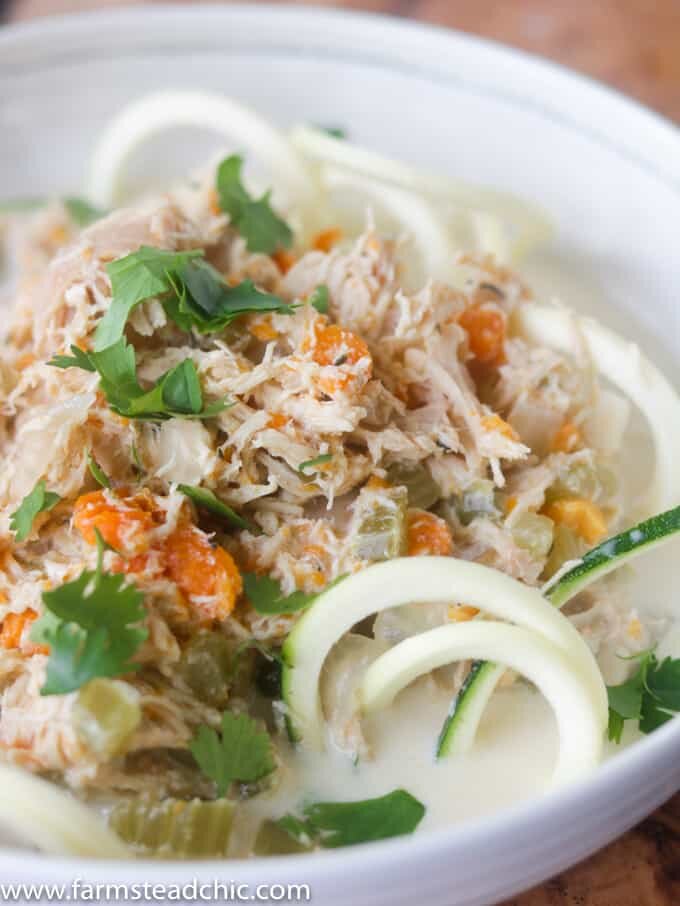 This Paleo and Whole30 Chicken Noodle Soup is gluten-free, grain-free and dairy-free with no added sugar or questionable ingredients. Traditional noodles are replaced with spiralized zucchini, or"zoodles," and the result is an incredibly tasty, truly healthy slow cooker meal with only eight ingredients! 