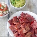 You need these Paleo and Whole30 Bacon Chips in your life. They're such an incredibly easy one-ingredient, grain-free, gluten-free healthy snack option. Prep them on Sunday and take them to work all week. Eat them alone or dip them in guacamole, salsa, habanero hot sauce, pico de gallo, cream cheese... The possibilities are endless! Check 'em out!