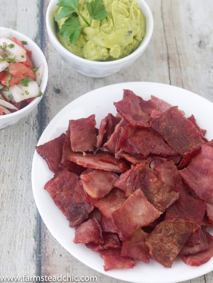 You need these Paleo and Whole30 Bacon Chips in your life. They're such an incredibly easy one-ingredient, grain-free, gluten-free healthy snack option. Prep them on Sunday and take them to work all week. Eat them alone or dip them in guacamole, salsa, habanero hot sauce, pico de gallo, cream cheese... The possibilities are endless! Check 'em out!