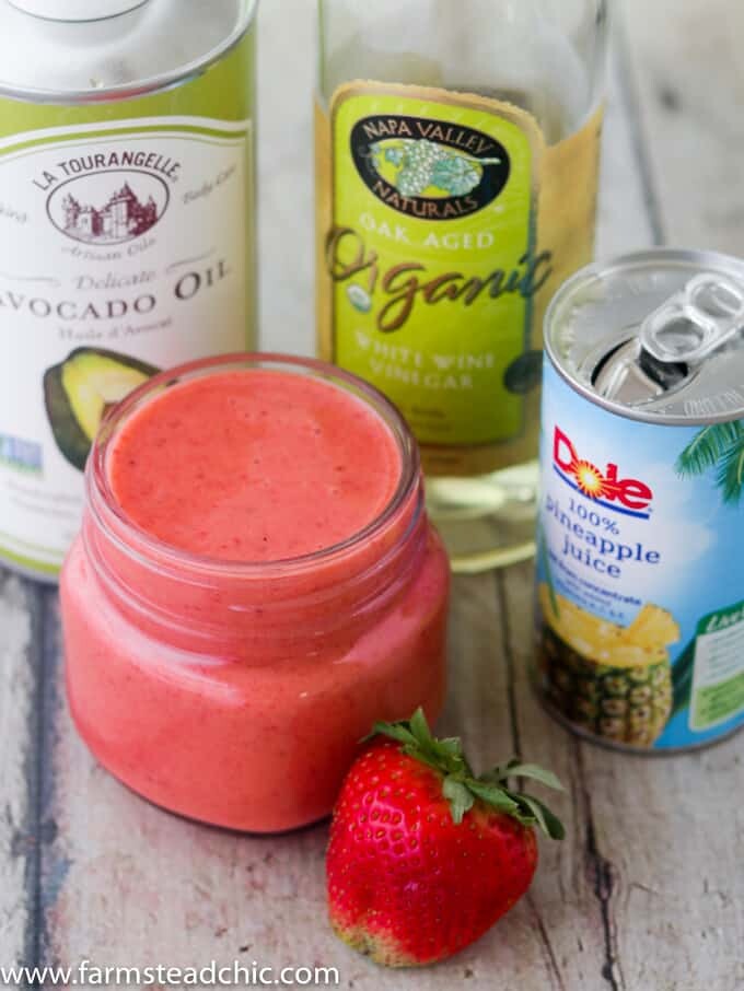 Get this this Paleo and Whole30 Strawberry Vinaigrette Dressing on your springtime dinner table! Made with only fresh strawberries, white wine vinegar, avocado oil and 100% pineapple juice, this fresh summer dressing is cheap, simple and easy. Primal, dairy free and vegetarian + vegan friendly!