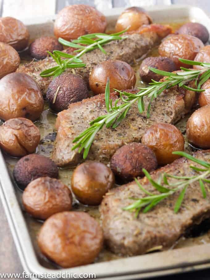 This Whole30 Steak and Potatoes Sheet Pan Dinner is the perfect meal for a busy weeknight or when you don't want to spend an hour in the kitchen. Rosemary and garlic highlight the flavor of the steak and veggies without overpowering them. This meal is so simple and easy to make with minimal prep and cleanup.