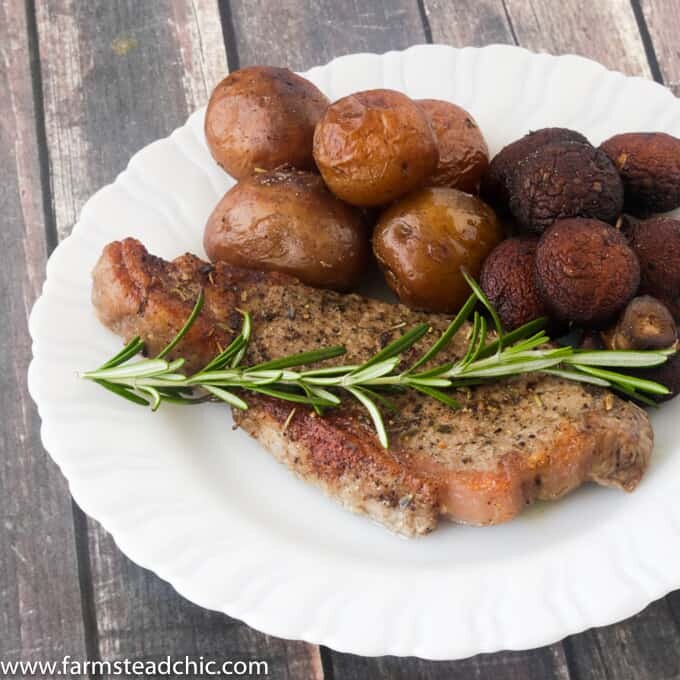 This Whole30 Steak and Potatoes Sheet Pan Dinner is the perfect meal for a busy weeknight or when you don't want to spend an hour in the kitchen. Rosemary and garlic highlight the flavor of the steak and veggies without overpowering them. This meal is so simple and easy to make with minimal prep and cleanup.