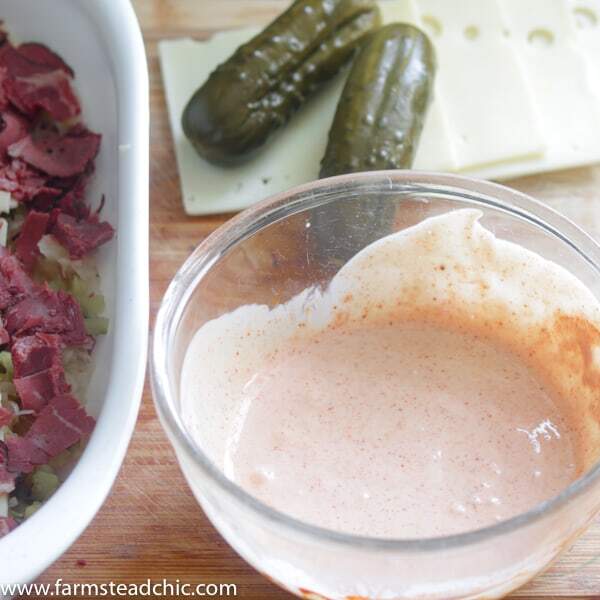 Low Carb, Keto Reuben Casserole with Swiss cheese, homemade Russian dressing and pickles