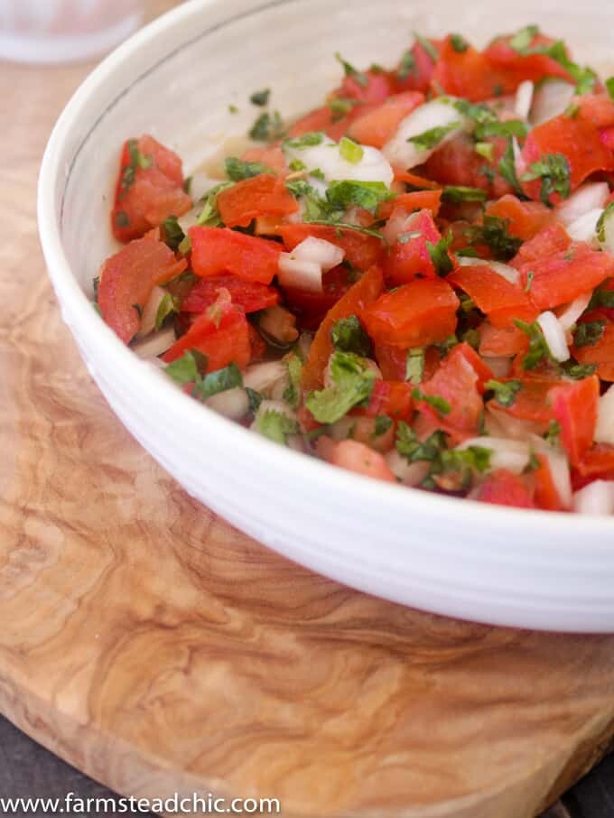 This Paleo and Whole30 Pico de Gallo is a quick and easy appetizer. Fresh tomatoes, onion, garlic, cilantro, lime juice and avocado oil and ten minutes are all you need. Vegan-, vegetarian-friendly.