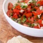 This Paleo and Whole30 Pico de Gallo is a quick and easy appetizer. Fresh tomatoes, onion, garlic, cilantro, lime juice and avocado oil and ten minutes are all you need. Vegan-, vegetarian-friendly.