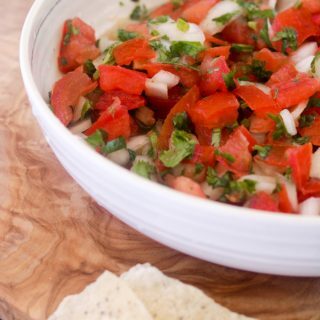 This Paleo and Whole30 Pico de Gallo is a quick and easy appetizer. Fresh tomatoes, onion, garlic, cilantro, lime juice and avocado oil and ten minutes are all you need. Vegan-, vegetarian-friendly.