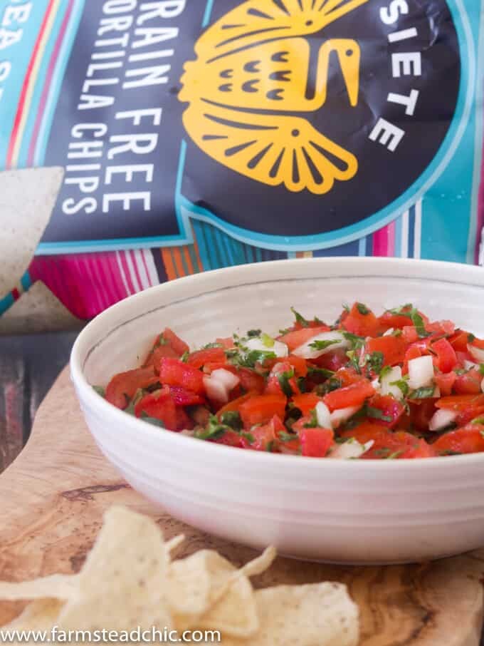 This Paleo and Whole30 Pico de Gallo is a quick and easy appetizer. Fresh tomatoes, onion, garlic, cilantro, lime juice and avocado oil and ten minutes are all you need. Vegan-, vegetarian-friendly.