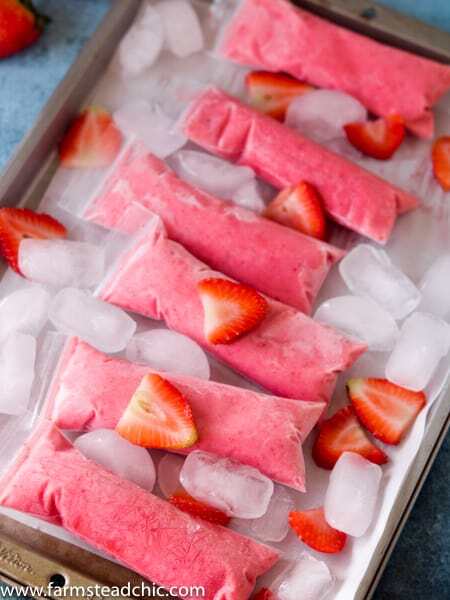 These Paleo Strawberry Coconut Popsicles are the perfect summer treat. Made with Whole30-compliant ingredients like strawberries, coconut milk, pineapple juice and OJ, they are healthy yet incredibly tasty. Dairy free, vegan and vegetarian-friendly.