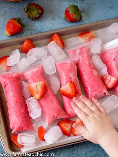 These Paleo Strawberry Coconut Popsicles are the perfect summer treat. Made with Whole30-compliant ingredients like strawberries, coconut milk, pineapple juice and OJ, they are healthy yet incredibly tasty. Dairy free, vegan and vegetarian-friendly.