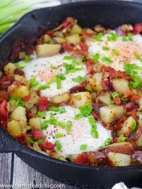 This Whole30 Breakfast Skillet is the perfect one-dish brunch! It's packed full of fresh veggies, herbs, eggs and bacon. Add it to your weekly rotation. #whole30 #cleaneating #farmsteadchic | www.farmsteadchic.com