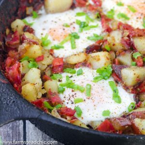 This Whole30 Breakfast Skillet is the perfect one-dish brunch! It's packed full of fresh veggies, herbs, eggs and bacon. Add it to your weekly rotation. #whole30 #cleaneating #farmsteadchic | www.farmsteadchic.com