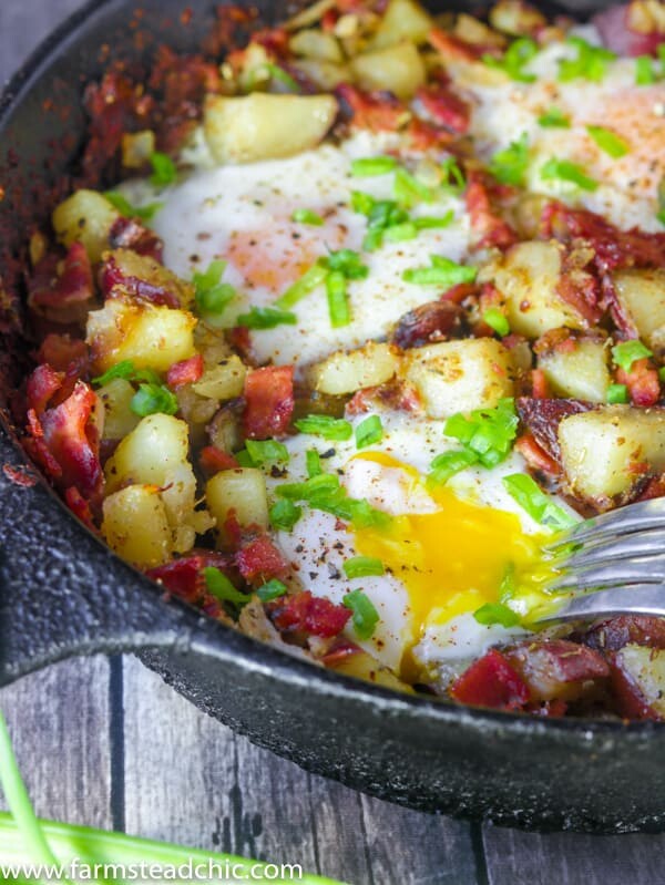 This Whole30 Breakfast Skillet is the perfect one-dish brunch! It's packed full of fresh veggies, herbs, eggs and bacon. Add it to your weekly rotation. #whole30 #cleaneating #farmsteadchic | www.farmsteadchic.com