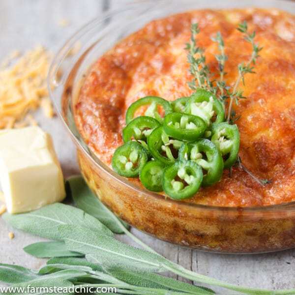 Keto Cheesy Sausage and Jalapeño Casserole with fresh sage and jalapeños, butter and shredded cheddar cheese.