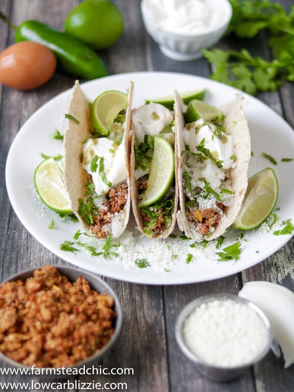 low carb keto chorizo breakfast tacos with cotija cheese, sour cream and cilantro