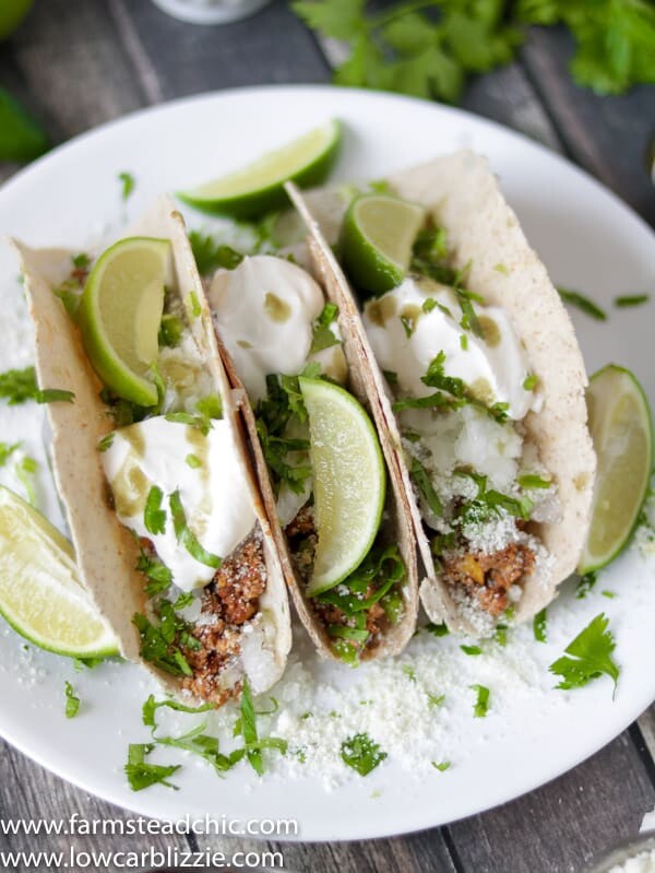 low carb keto chorizo breakfast tacos with cotija cheese, sour cream and cilantro