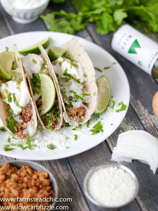 low carb keto chorizo breakfast tacos with cotija cheese, sour cream and cilantro