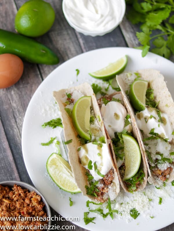 low carb keto chorizo breakfast tacos with cotija cheese, sour cream and cilantro